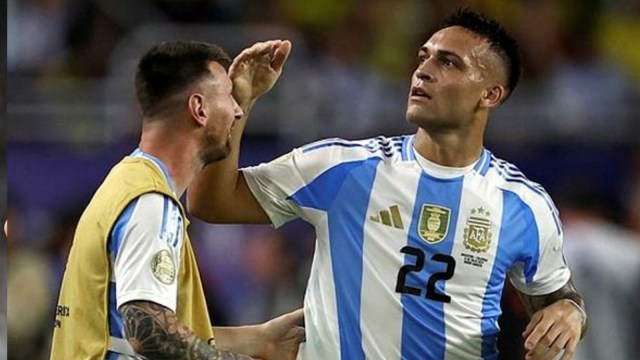 Lautaro Martinez celebrates his winning goal with an injured Lionel Messi. (Reuters)