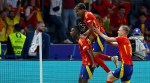 Spain’s Nico Williams celebrates with Lamine Yamal and Dani Olmo after scoring the first goal. (Reuters)