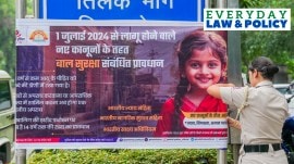 A poster depicting the implementation of three new criminal laws being put up by Delhi Police to raise awareness, in New Delhi, Monday, July 1, 2024.