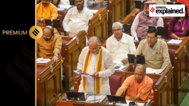 Uttar Pradesh Finance Minister Suresh Khanna presents a supplementary budget in the presence of Chief Minister Yogi Adityanath and other members during the Monsoon session of state Legislative Assembly at Vidhan Bhawan, in Lucknow, Tuesday, July 30, 2024.