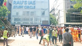 UPSC students flood death, coaching basement flood, coaching centre deaths, counter claims, fly over drain desilting, Old Rajinder Nagar, AAP vs BJP over drain desilting, Saurabh Bharadwaj, L-G V K Saxena and Chief Secretary Naresh Kumar, Delhi desilting work, monsoon season, Indian express news