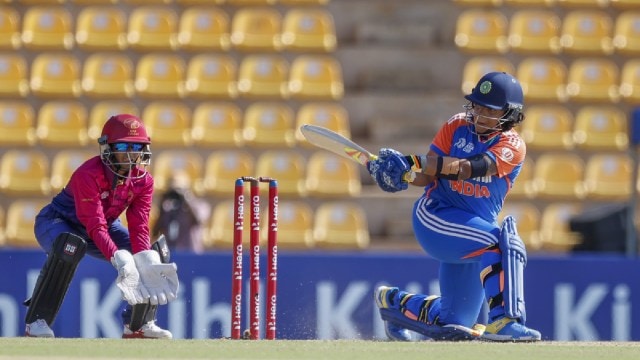 Richa Ghosh of India plays a shot during the ACC Women's T20 Asia Cup 2024 match between India and UAE, at the Rangiri Dambulla International Cricket Stadium in Dambulla, Sri Lanka, Sunday, July 21, 2024. (PTI Photo via ACC)