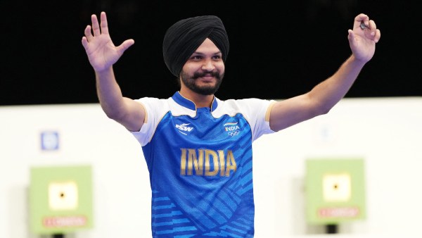 Sarabjot Singh of India celebrates his bronze medal win