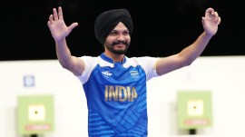 Sarabjot Singh of India celebrates his bronze medal win