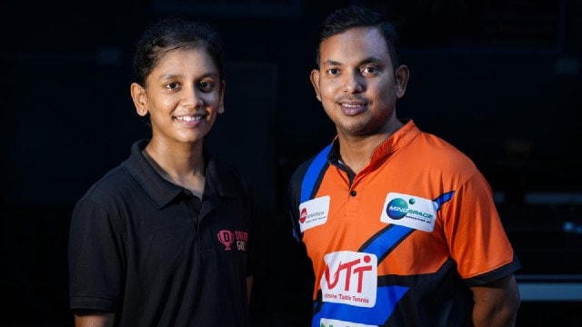 Sreeja Akula with her coach Somnath