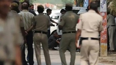 Rajkot Police, Murder accused found drunk, Gujarat Prohibition Act, probe against constable, Rajkot Central Jail, Section 223, BNS, Indian express news