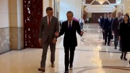 In this image taken from video released by the Ukraine Ministry of Foreign Affairs, Ukraine's Foreign Ministry Dmytro Kuleba, left walks with China's Foreign Minister Wang Yi before a meeting in the southern Chinese city of Guangzhou on Wednesday, July 24, 2024. Ukraine's foreign minister says he is seeking "common ground" in talks with his Chinese counterpart on ending his country's war with Russia. It is the first visit by a Ukrainian foreign minister since the war started in 2022. (Ukraine's Ministry of Foreign Affairs via AP)