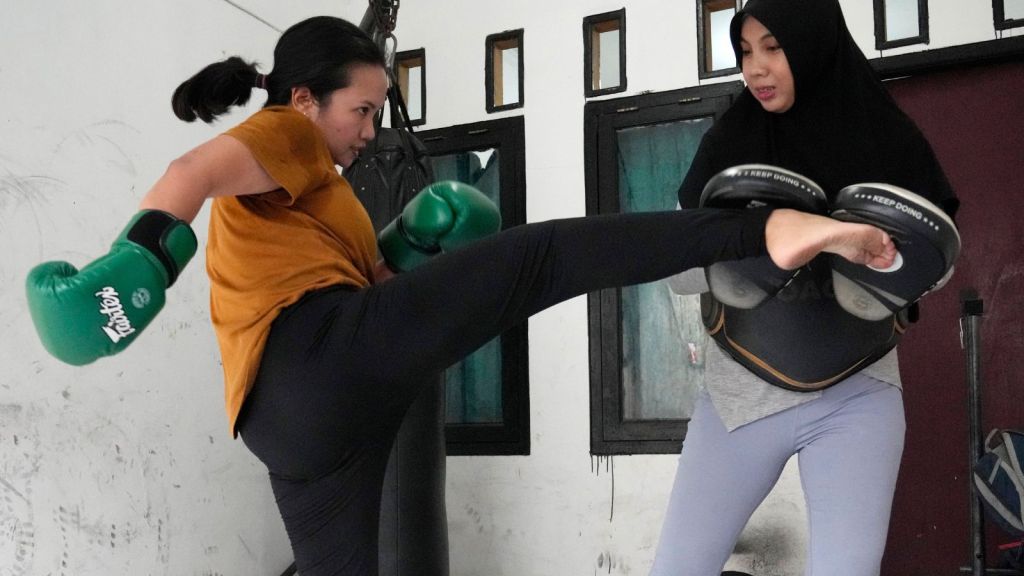 Indonesian women assert themselves with martial arts as gender-based