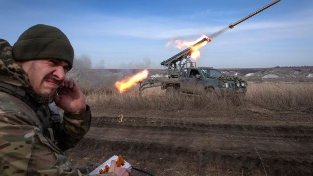 A Ukrainian officer with the 56th Separate Motorized Infantry Mariupol Brigade fires rockets from a pickup truck at Russian positions on the front line near Bakhmut in Ukraine's Donetsk region on March 5, 2024. Ukraine faces twin challenges of fighting Russia and the shifting political sands in the US. (AP Photo/Efrem Lukatsky) Ukraine