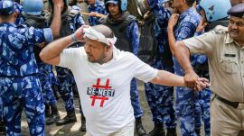 Several Youth Congress workers shaved their heads as a sign of protest while raising "anti-Modi" slogans. NEET