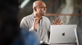 Zoho's Rajendran Dandapani sitting with a MacBook.