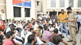 Owners of restaurants take out a rally in protest of the RMC drive to seal premises not having fire NOC, in Rajkot on Wednesday. Express pho0