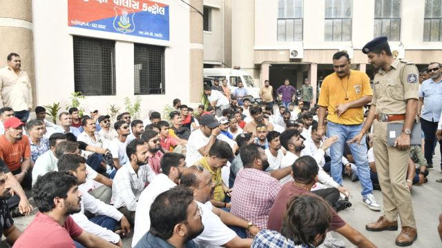 Owners of restaurants take out a rally in protest of the RMC drive to seal premises not having fire NOC, in Rajkot on Wednesday. Express pho0
