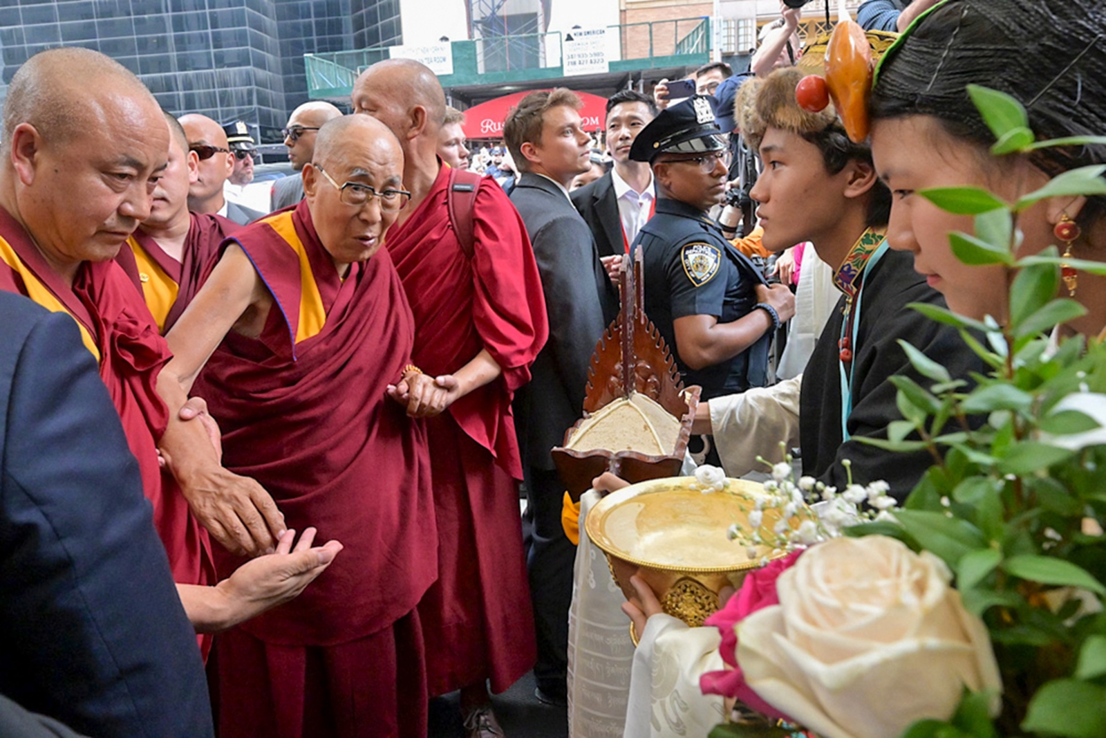 Tibetan spiritual leader Dalai Lama being welcomed by members of the Tibetan community upon his arrival in New York last month. (PTI)