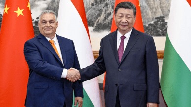 In this photo released by Xinhua News Agency, Hungarian Prime Minister Viktor Orban, left, shakes hands with Chinese President Xi Jinping before a meeting at the Diaoyutai State Guest House in Beijing, Monday, July 8, 2024. (AP)