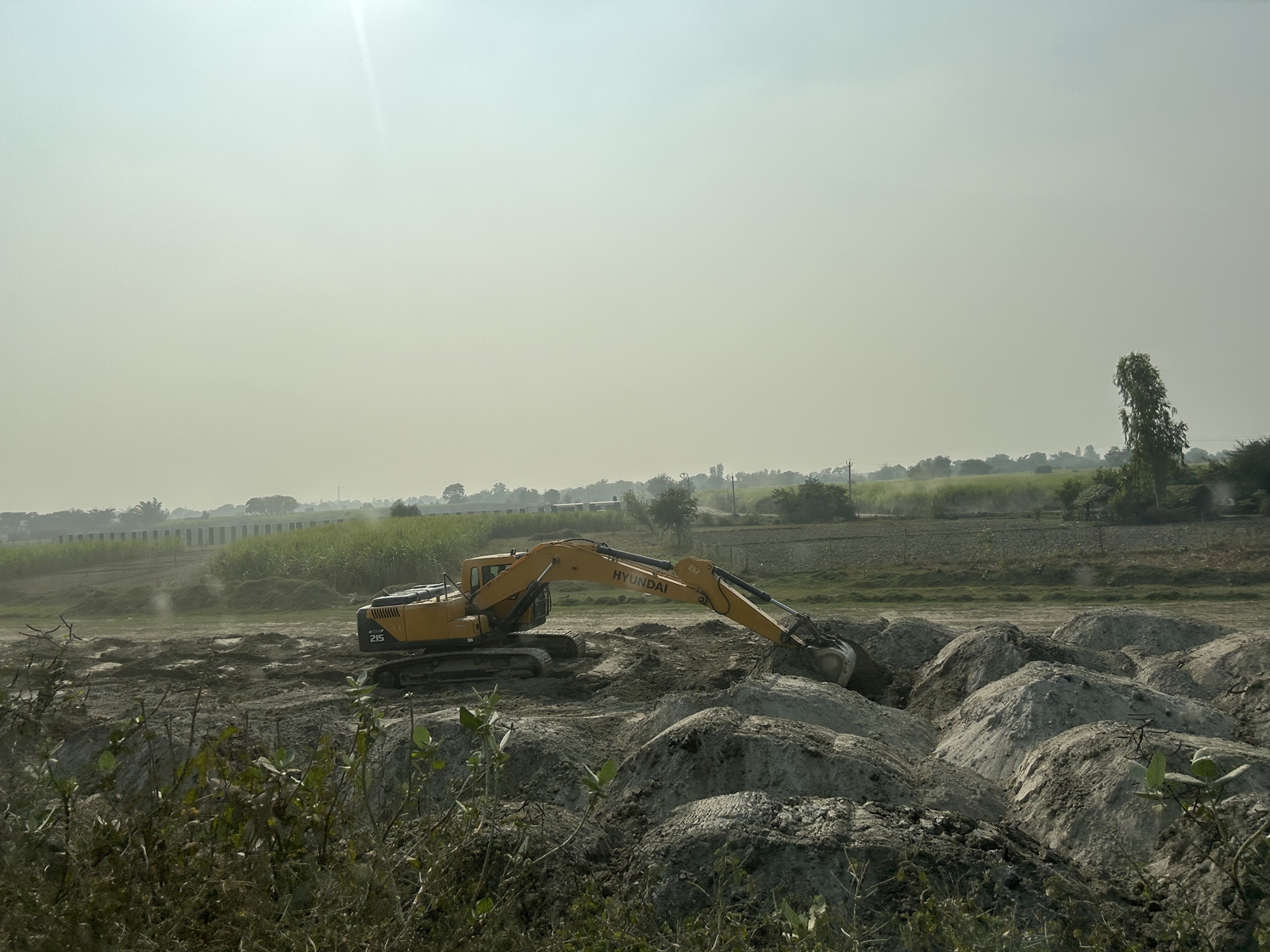 Ongoing construction work at land belonging to HOABL in Tihura Manjha. (Express)