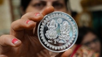 anant ambani, radhika merchant, wedding, ambani wedding, antilia, silver coin