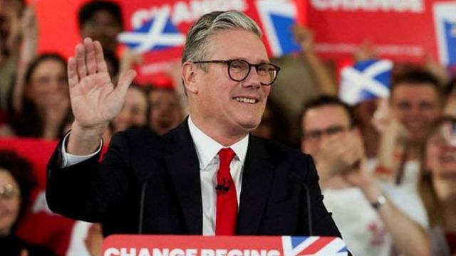 Keir Starmer, leader of Britain's Labour party, reacts as he speaks at a reception to celebrate his win in the election, at Tate Modern, in London