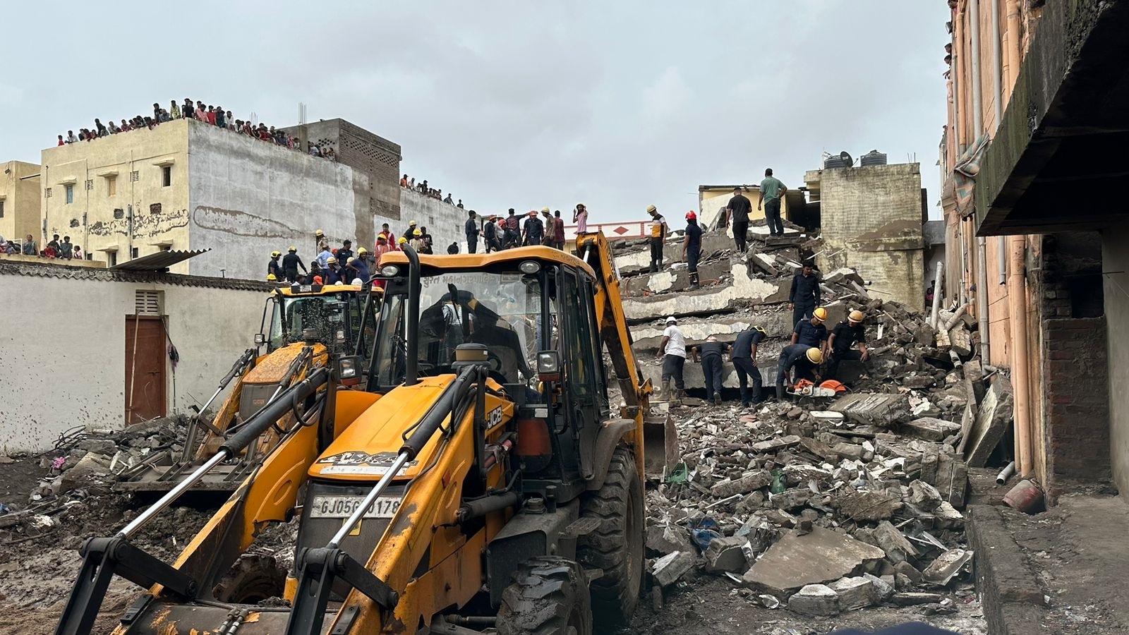 A dilapidated building collapsed in Surat on Saturday, killing seven. (Express photo)