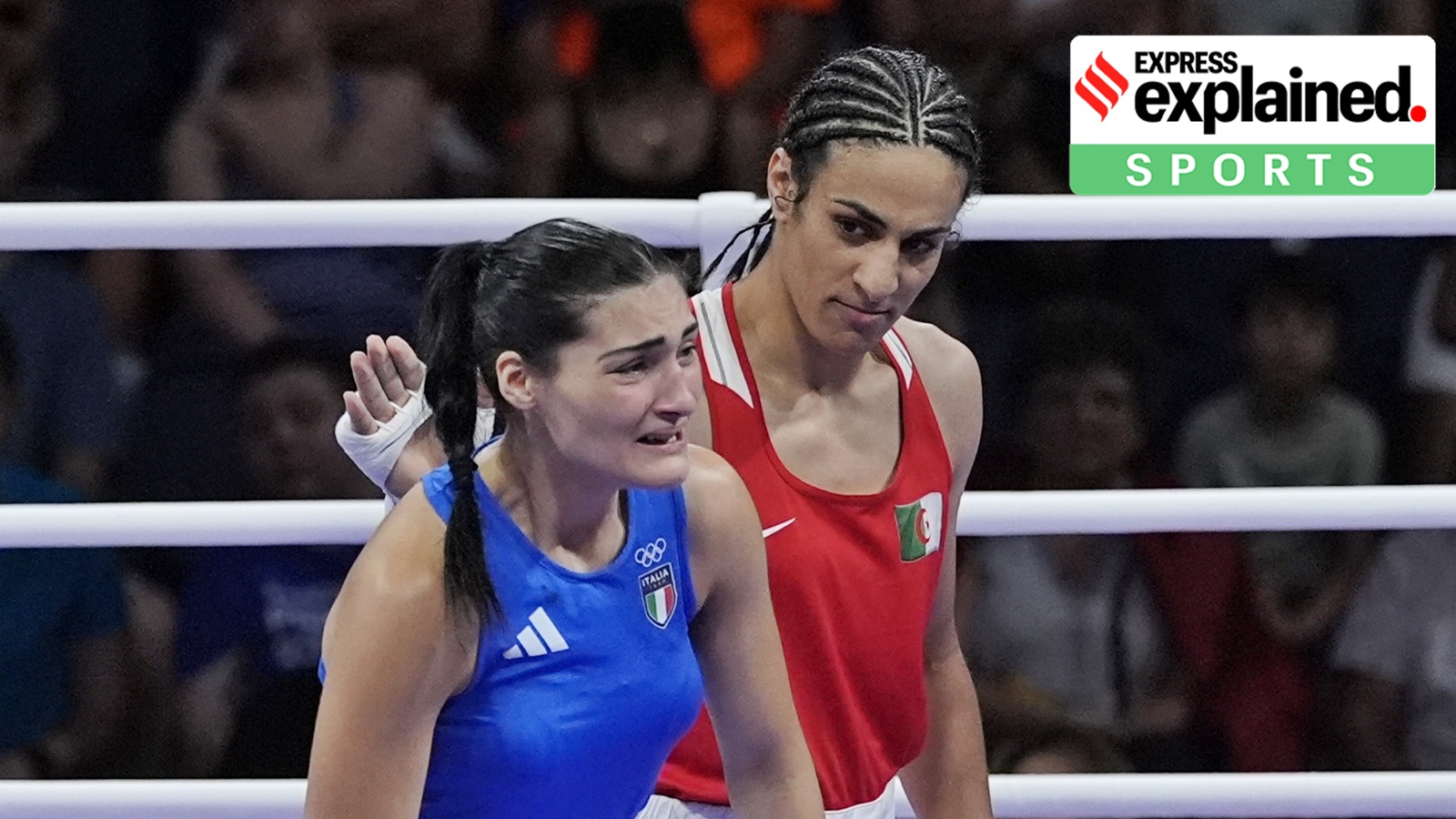 Algeria's Imane Khelif, red, next to Italy's Angela Carini, at the end of their women's 66kg preliminary boxing match at the 2024 Summer Olympics, Thursday, Aug. 1, 2024, in Paris, France.