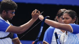India's Ankita Bhakat competes along with Dhiraj Bommadevara during the archery mixed team quarterfinal at the Paris 2024 Olympics on Friday. (AP Photo)
