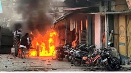Vehicles set on fire by miscreants over the demolition of an "illegally built" madrasa at Banbhoolpura area, in Haldwani,