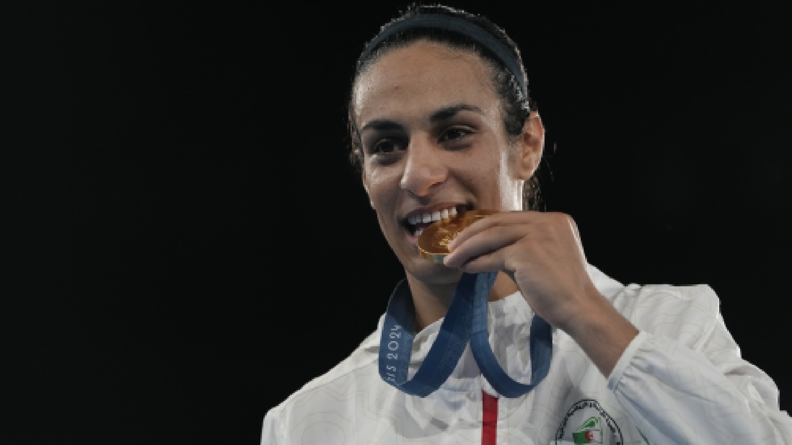 Gold medalist Algeria's Imane Khelif poses during a medals ceremony for the women's 66 kg final boxing match at the 2024 Summer Olympics