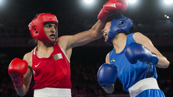 Algeria's Imane Khelif, left, fights China's Yang Liu in their women's 66 kg final boxing match at the 2024 Summer Olympics