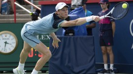 Italy's Jannik Sinner lunges for a shot from Croatia's Borna Coric during their second-round match at the National Bank Open tennis tournament Thursday, Aug. 8, 2024, in Montreal. (Ryan Remiorz/The Canadian Press via AP)