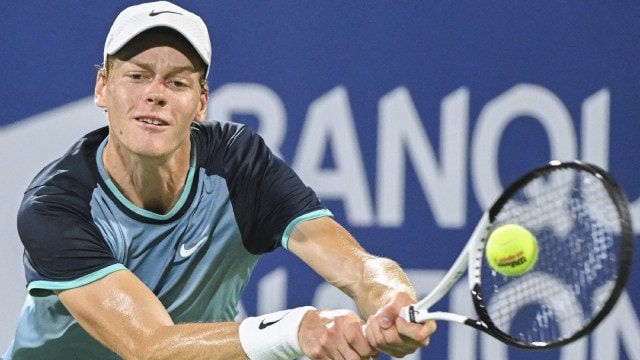 Jannik Sinner plays a shot during their quarter-final match at the National Bank Open tennis tournament in Montreal. (The Canadian Press via AP)