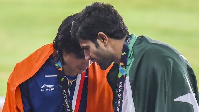 In this Aug. 27, 2018 file photo, Gold medalist India's Neeraj Chopra with bronze medalist Pakistan's Arshad Nadeem poses for photographs at the medal ceremony of the men's javelin throw event during the 18th Asian Games 2018, in Jakarta, Indonesia. (PTI Photo)