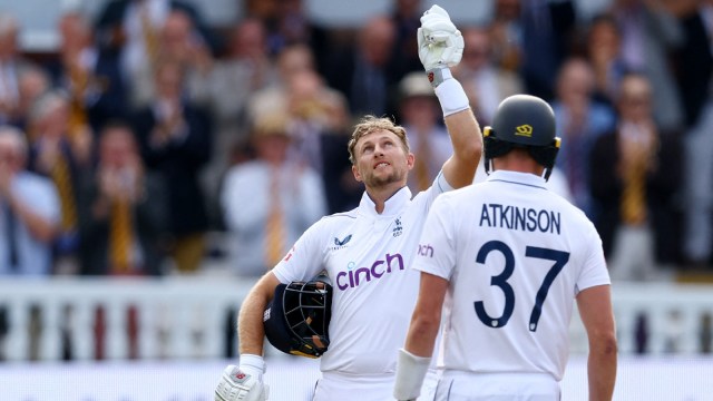 England's Joe Root celebrates after reaching his century