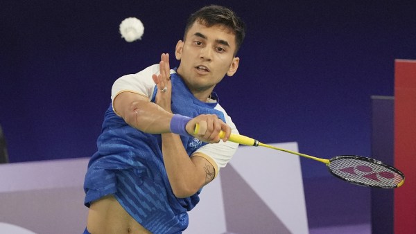 India's Lakshya Sen plays against Belgium's Julien Carraggi during their men's singles badminton group stage match at Port de la Chapelle Arena during the 2024 Summer Olympics, Monday, July 29, 2024, in Paris, France. (AP Photo)