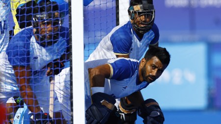 Manpreet Singh of India and his teammates in action during a penalty corner.