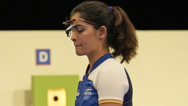 India's Manu Bhaker prepares to compete in the 10m air pistol mixed team bronze medal event at the 2024 Summer Olympics