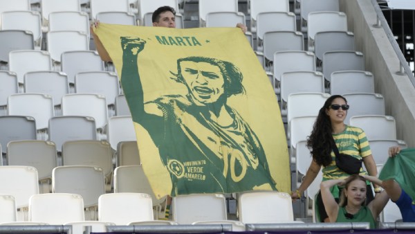 A fan displays a banner with the portrait of Brazil's Marta during the women's Group C soccer match between Nigeria and Brazil at the Bordeaux stadium during the 2024 Summer Olympics