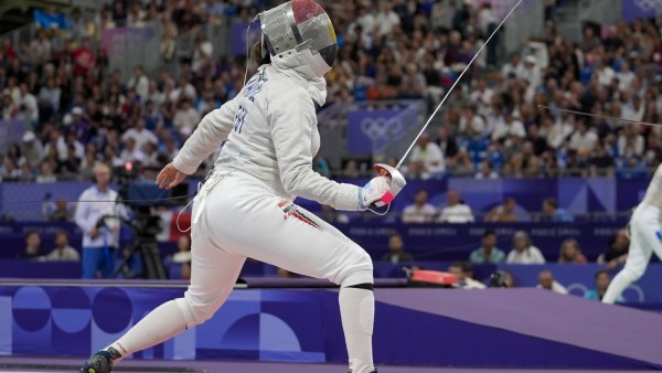 Egypt's Nada Hafez, who was pregnant, competes with United States' Elizabeth Tartakovsky in the women's individual Sabre round of 32 competition during the 2024 Summer Olympics at the Grand Palais, Monday, July 29, 2024, in Paris, France. (AP Photo