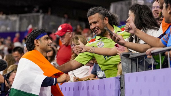 Silver medallist India's Neeraj Chopra with fans after the men's javelin throw final at the 2024 Summer Olympics, in Paris, France,