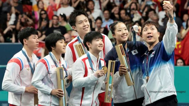 ‘True sportsmanship’: North, South Korean athletes celebrate together