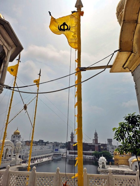 The Basanti (Panthic) Nishan Sahib in the Golden Temple complex in Amritsar. 