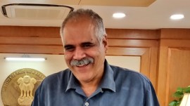 Rahul Bhatia, IndiGo stake, InterGlobe, domestic market share, business class, loyalty programme, cost leadership, global airlines, fleet size, aircraft order, domestic destinations, international destinations, airline operations, 100 million passengers, IndiGo network.