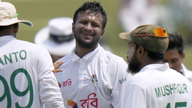 Bangladesh's Shakib Al Hasan, center celebrates with teammates after taking the wicket of Pakistan's Abdullah Shafique during the fifth day of first cricket test match between Pakistan and Bangladesh, in Rawalpindi, Pakistan