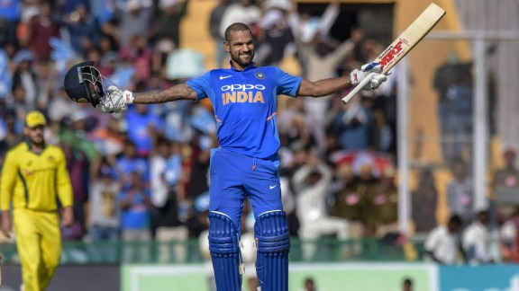 India's Shikhar Dhawan celebrates his century during the 4th ODI cricket match against Australia, in Mohali