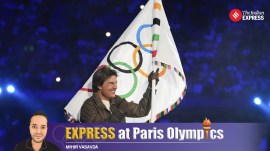 Tom Cruise carries the Olympic flag during the Paris 2024 Olympics closing ceremony at the Stade de France