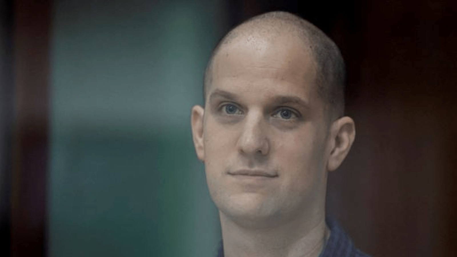 Wall Street Journal reporter Evan Gershkovich, who stands trial on spying charges, is seen inside an enclosure for defendants before a court hearing in Yekaterinburg, Russia June 26, 2024. REUTERS