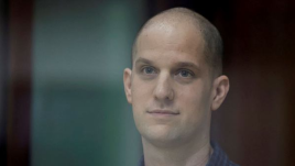 Wall Street Journal reporter Evan Gershkovich, who stands trial on spying charges, is seen inside an enclosure for defendants before a court hearing in Yekaterinburg, Russia June 26, 2024. REUTERS