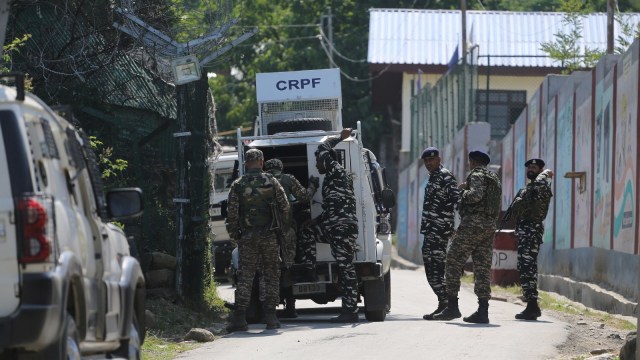 Security forces personnel during a military encounter, in Anantnag district of Jammu and Kashmir. (Express photo)
