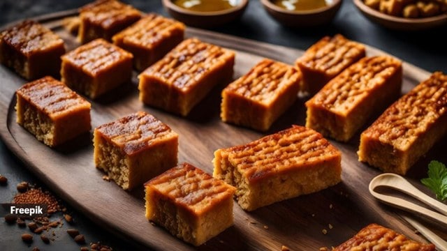 Traditional barfi is typically smooth and dense, often made from ingredients like condensed milk or khoya that create a melt-in-the-mouth consistency, roti