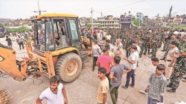 MCD halts demolition drive, MCD demolition drive, Delhi High Court order, Bhalswa dairies, Ghogha Dairy Colony, dairy demolition drive, Delhi news, India news, Indian express