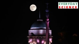 Photographed with multi exposure method, the super blue moon is seen over the Kartavya path in New Delhi in 2023.